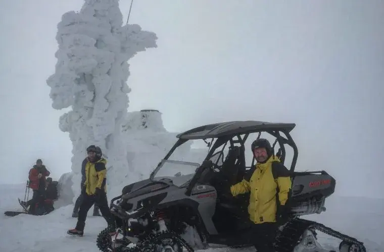 Cairngorms mountain rescure team, wearing Cioch jackets, in the mountains.